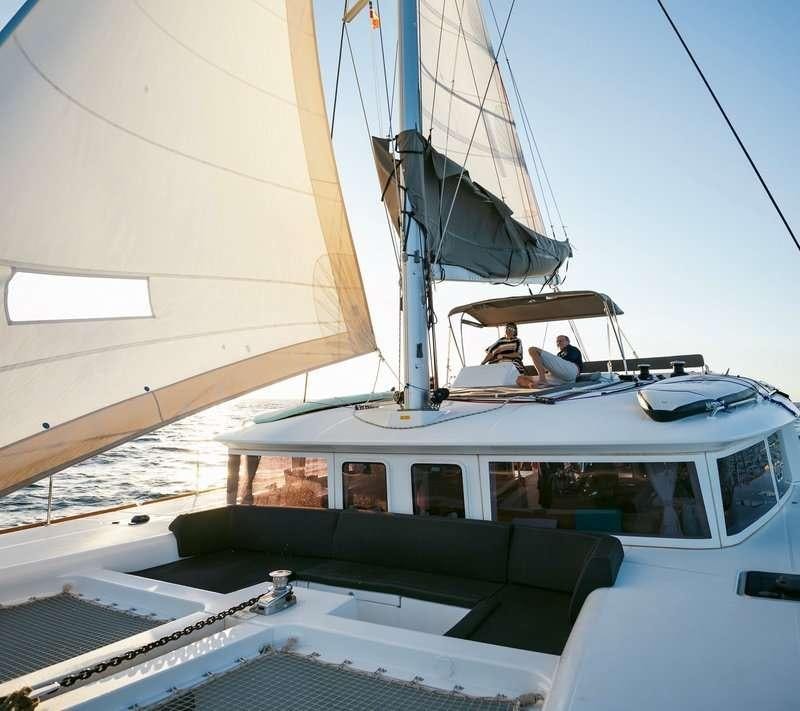 a boat with a canopy aboard Madrigal V Yacht for Charter