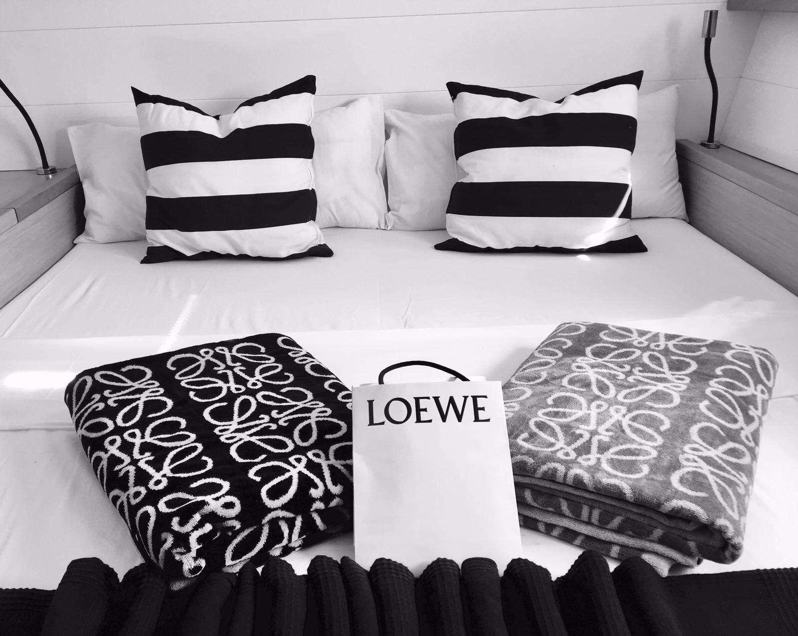 pillows on a bed aboard Madrigal V Yacht for Charter