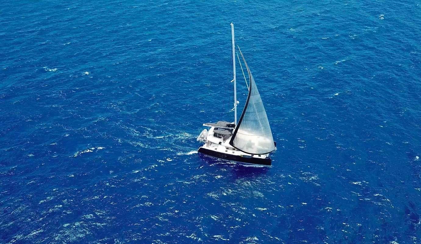 a sailboat in the ocean aboard VENTANA Yacht for Charter
