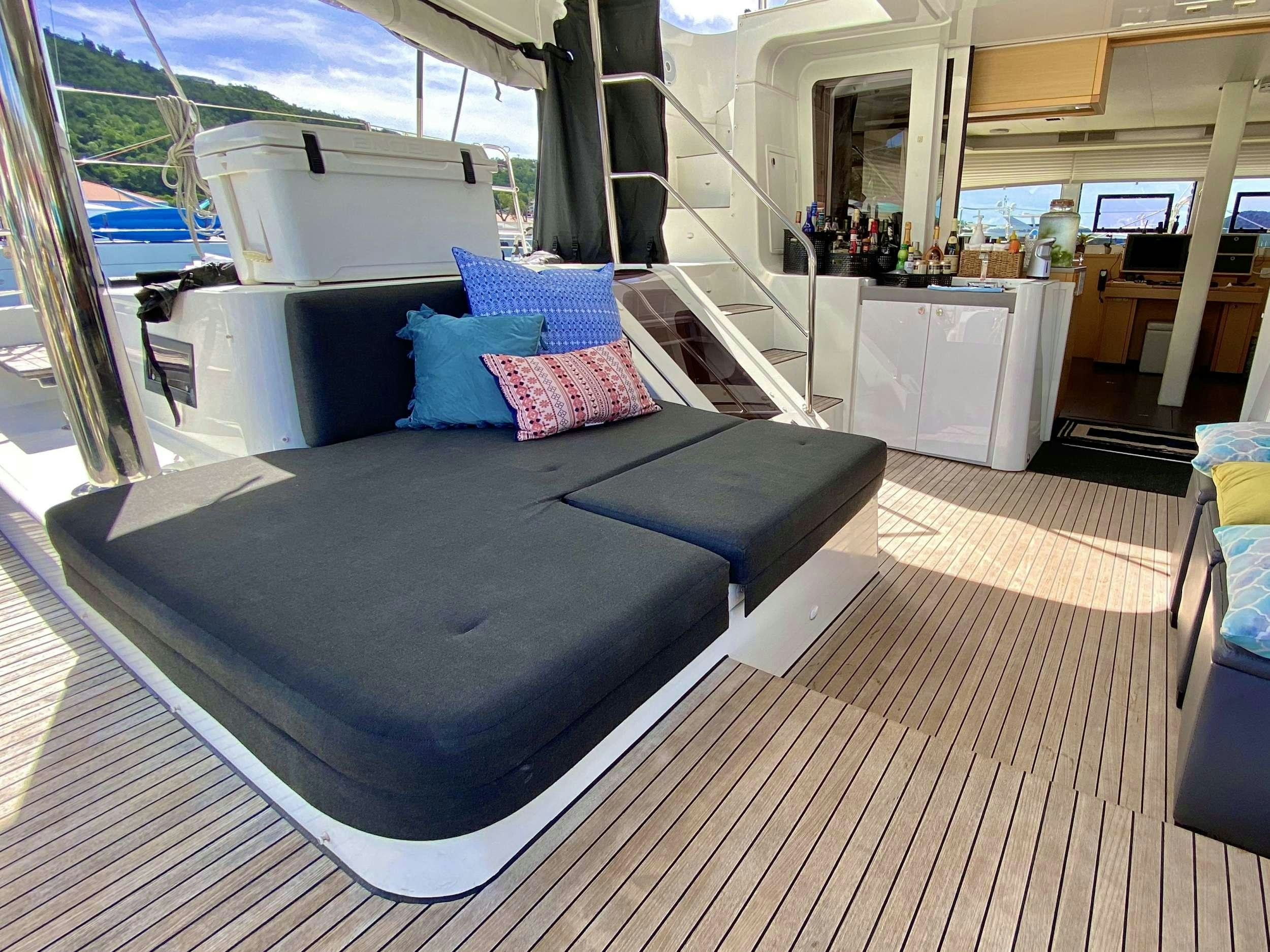 a bed in a room aboard VENTANA Yacht for Charter