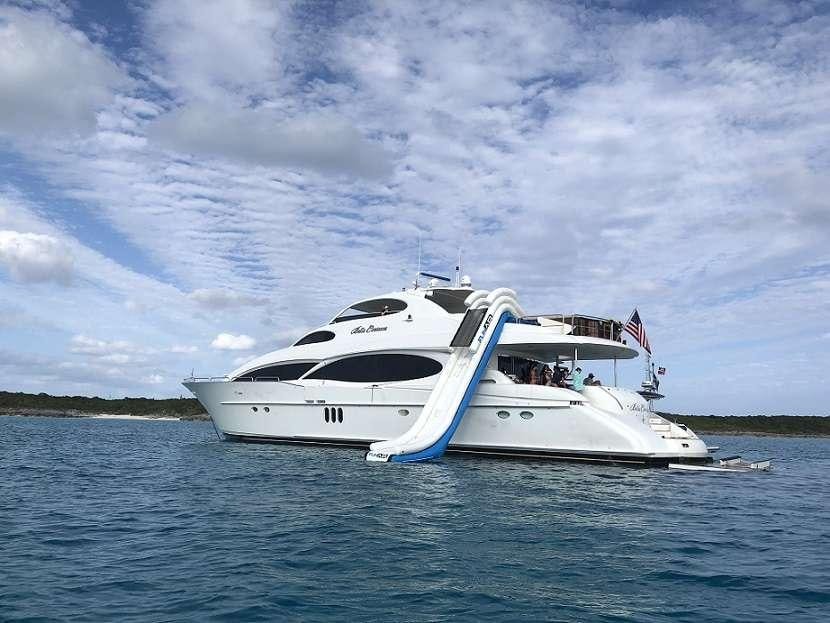 a white boat on the water aboard BELLA CONTESSA Yacht for Charter