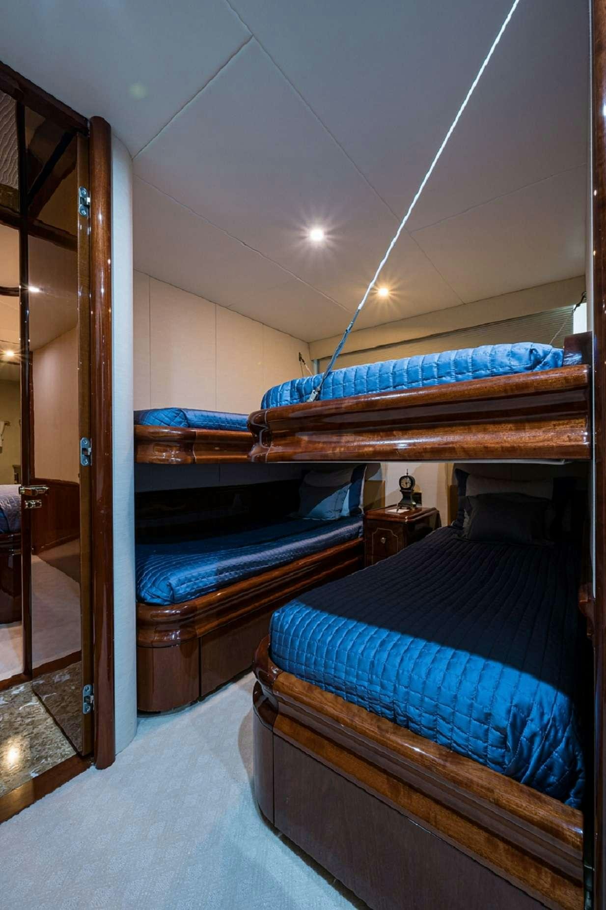 a couple of beds in a room aboard BELLA CONTESSA Yacht for Charter