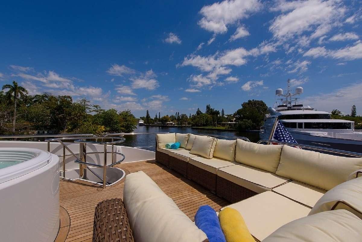 a balcony overlooking a body of water aboard BELLA CONTESSA Yacht for Charter