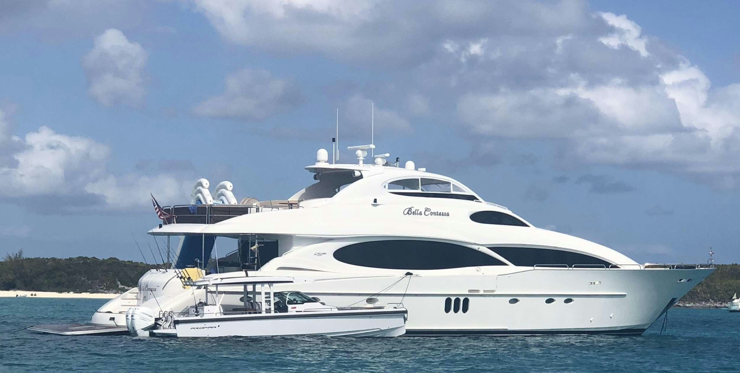 a white yacht in the water aboard BELLA CONTESSA Yacht for Charter
