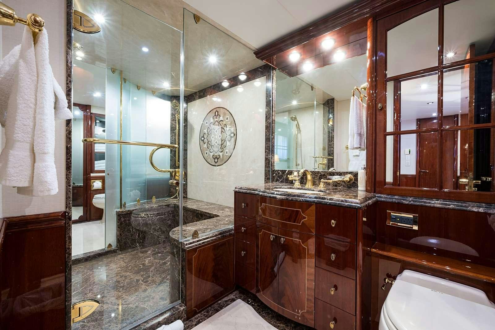 a bathroom with a large mirror aboard BELLA CONTESSA Yacht for Charter