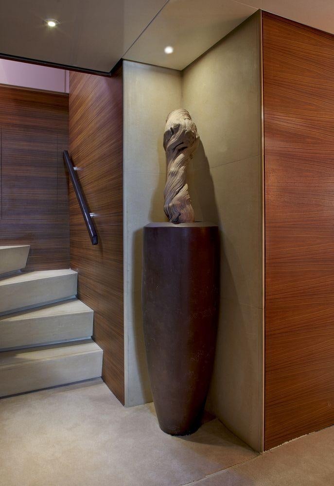 a statue of a person holding a sword aboard TROPICANA Yacht for Charter