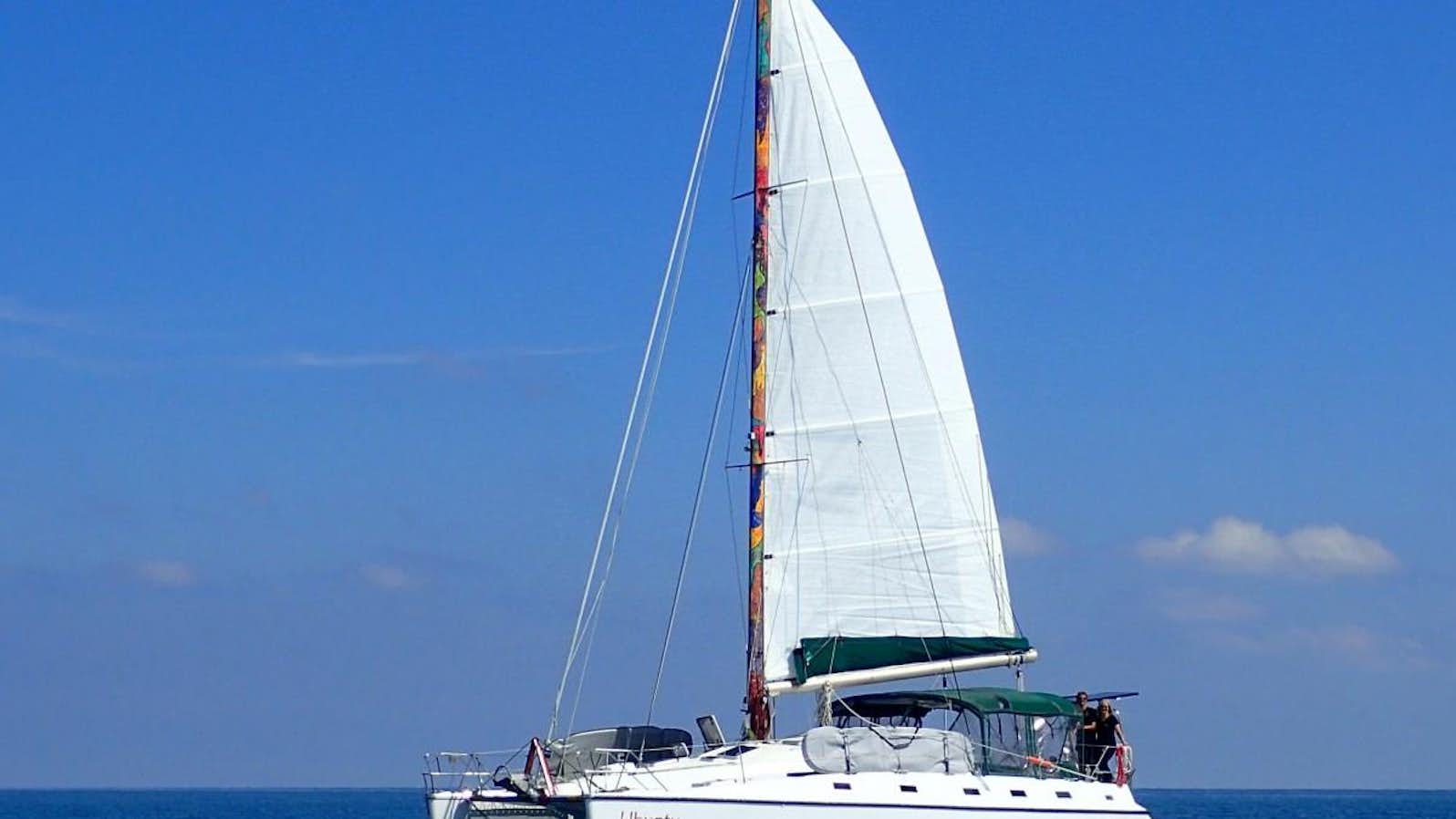 a sailboat on the water aboard UBUNTU Yacht for Charter