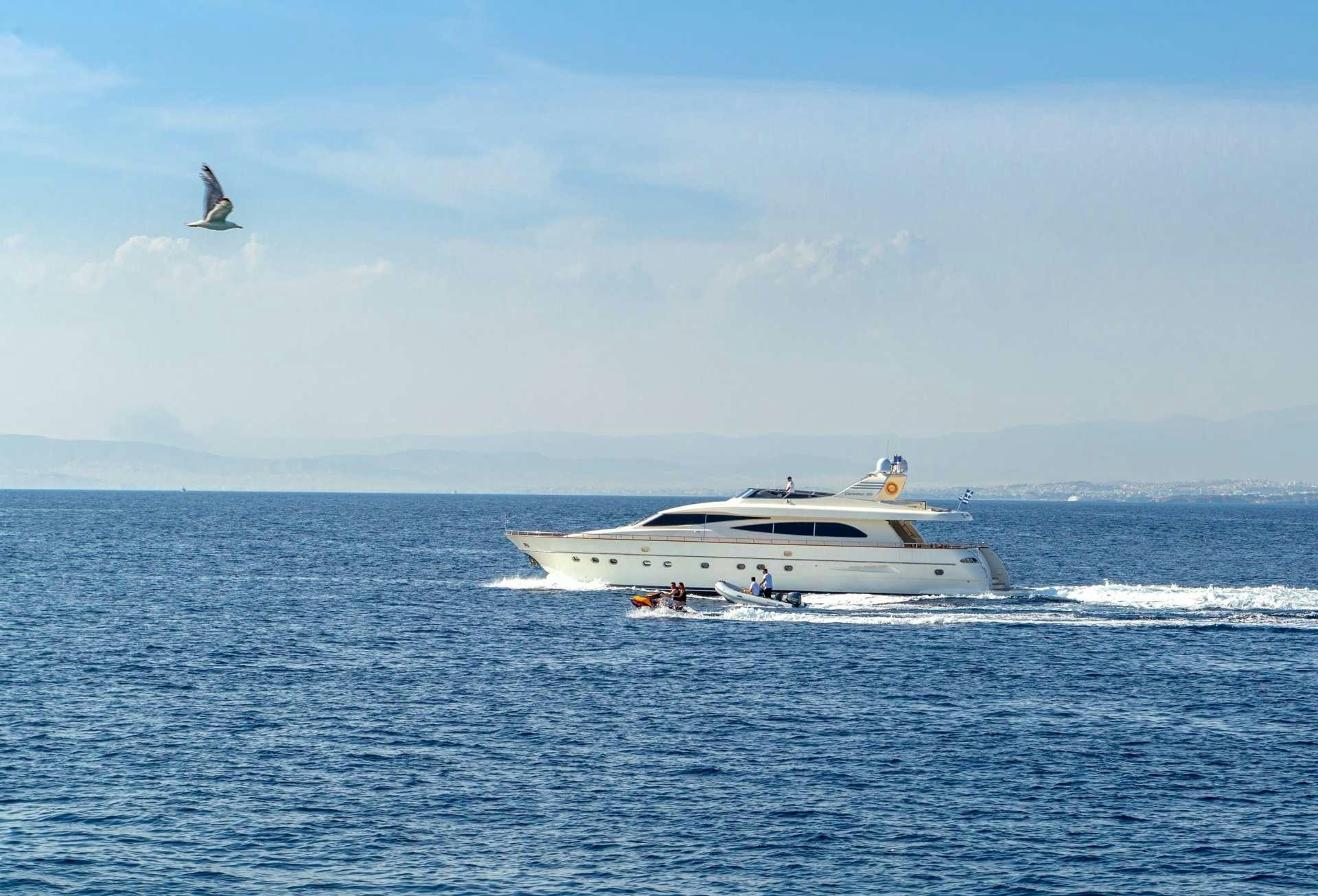 a boat sailing in the sea aboard VYNO Yacht for Charter