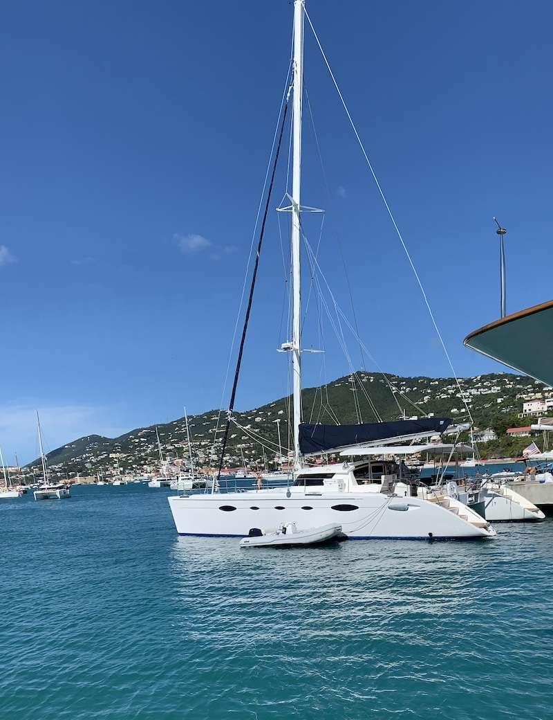 a sailboat in the water aboard VIVO Yacht for Charter