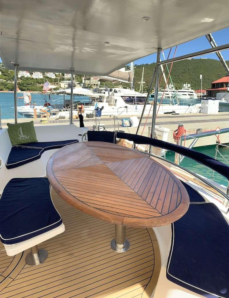 a table on a boat aboard VIVO Yacht for Charter