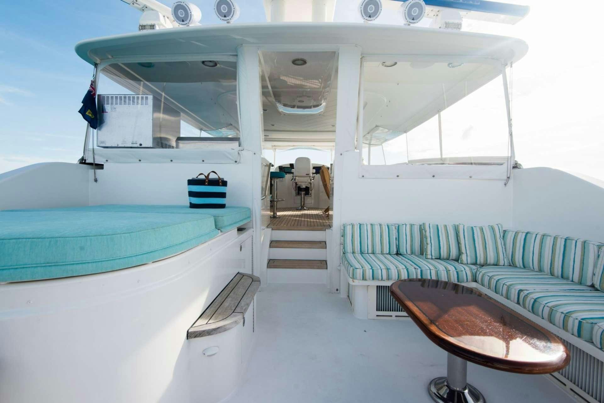 a room with a table and chairs aboard PIPE DREAMS Yacht for Charter