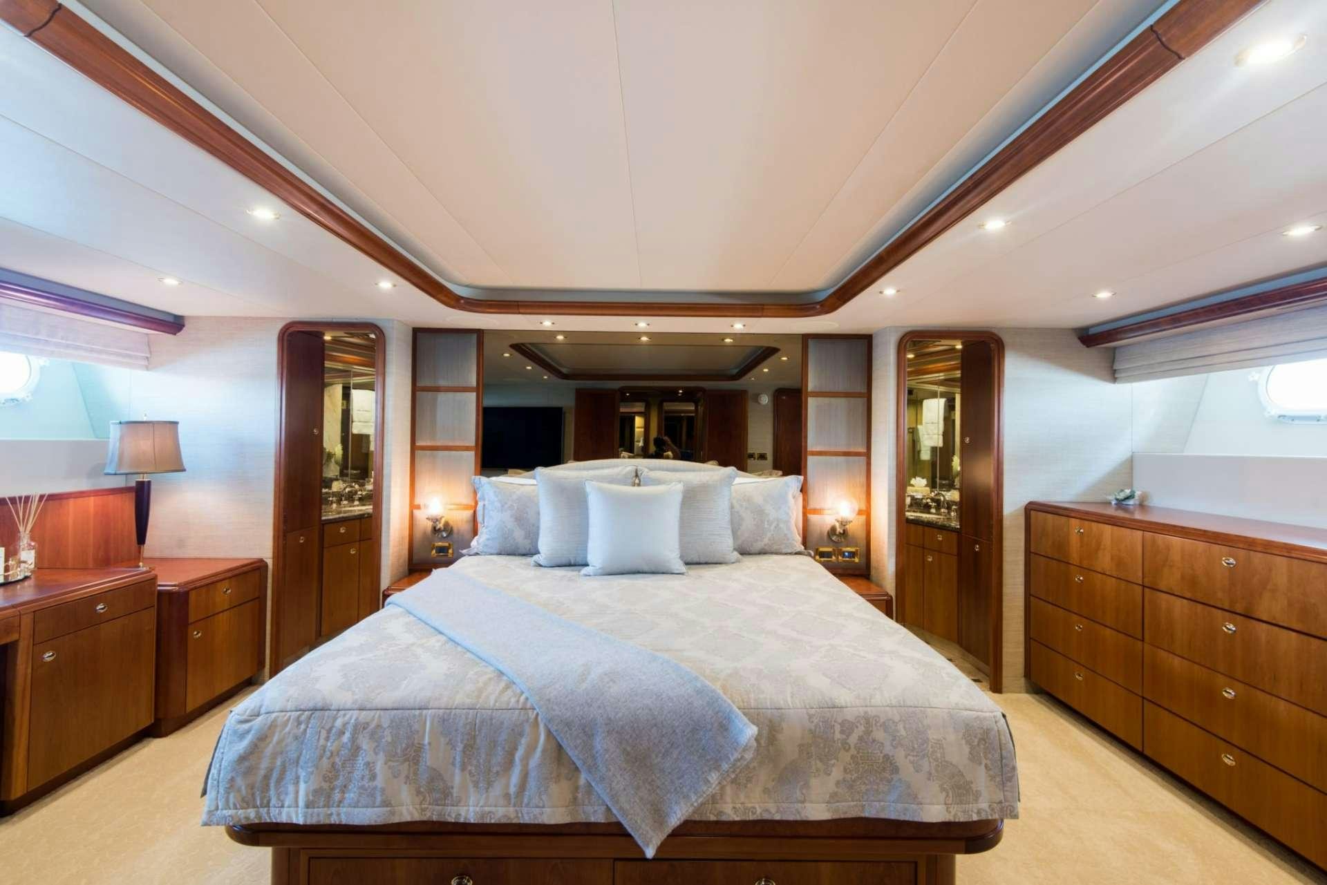 a large bed in a hotel room aboard PIPE DREAMS Yacht for Charter