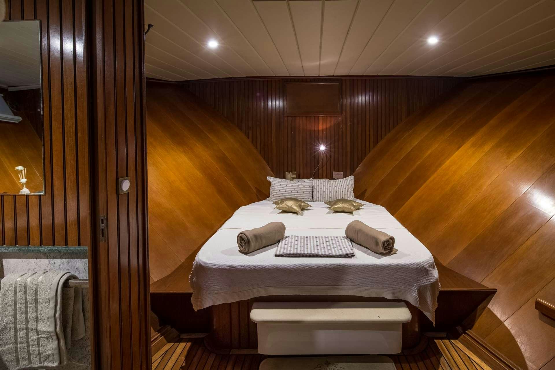 a table with a towel and a towel on it aboard Summer Princess Yacht for Charter