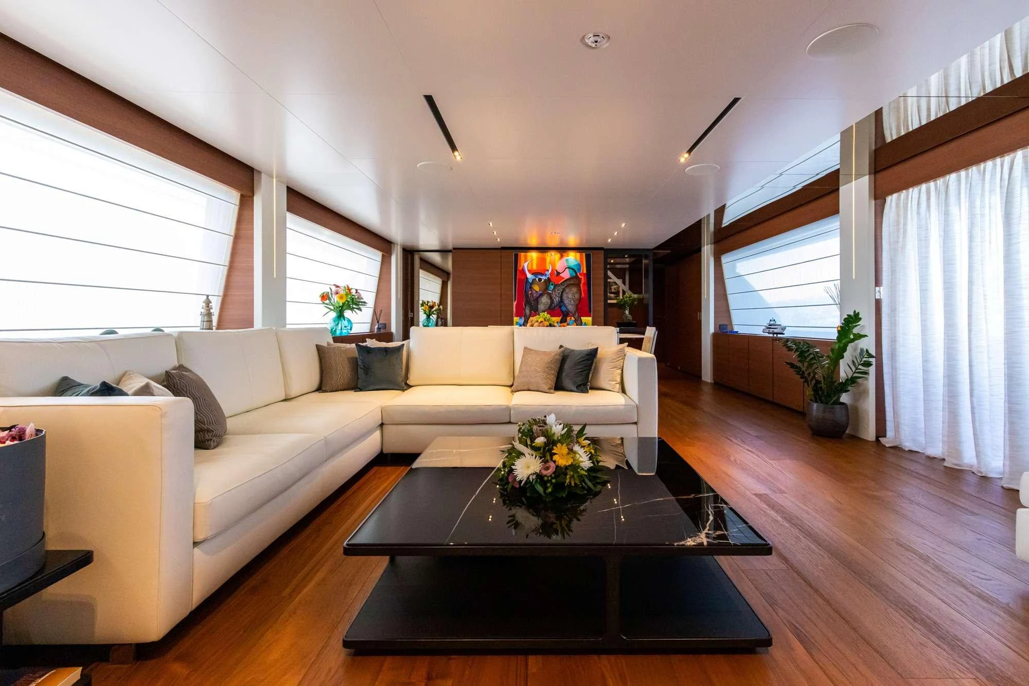 a living room with a couch and coffee table aboard PENELOPE Yacht for Charter