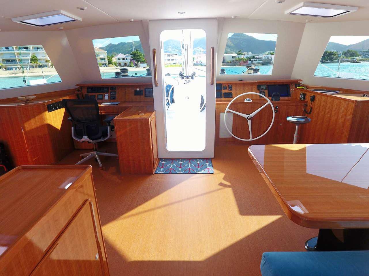 a classroom with desks and chairs aboard SKYLARK Yacht for Charter