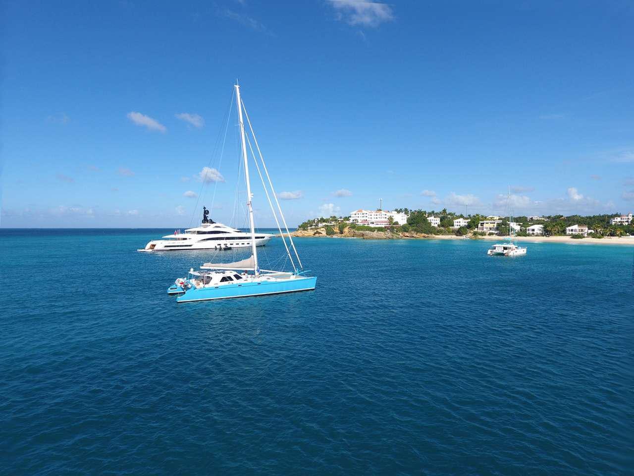 a boat sailing on the water aboard SKYLARK Yacht for Charter