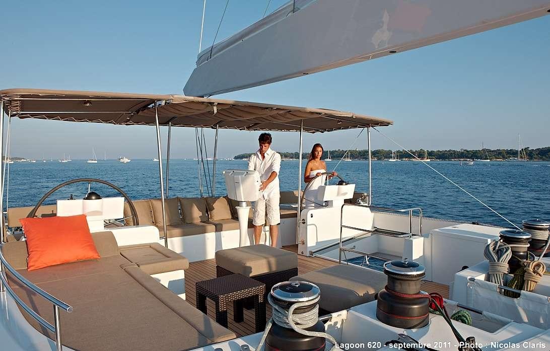 a couple of people on a boat aboard FIREFLY Yacht for Charter
