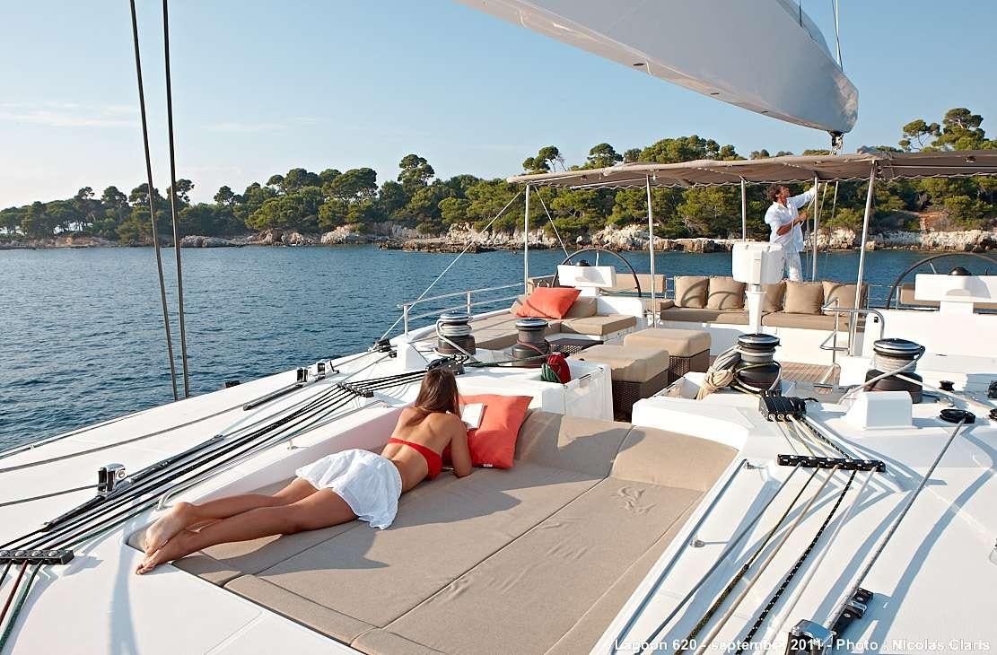 a person lying on a boat aboard FIREFLY Yacht for Charter