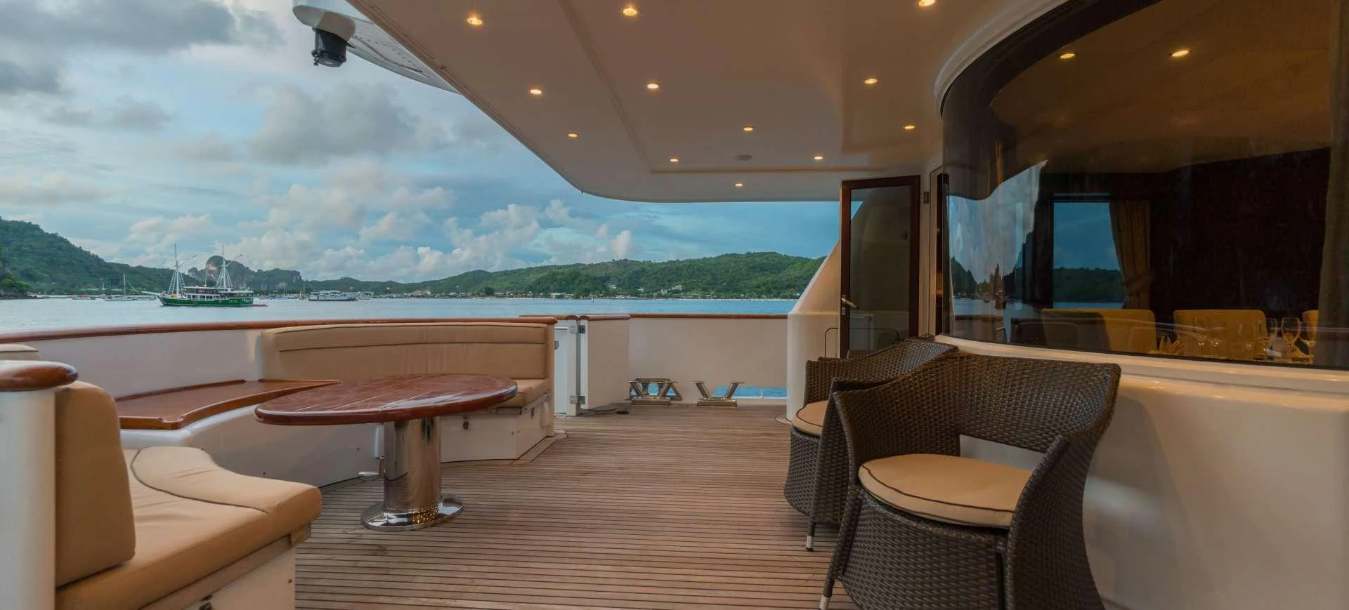 a room with a table and chairs aboard XANADU OF LONDON Yacht for Charter