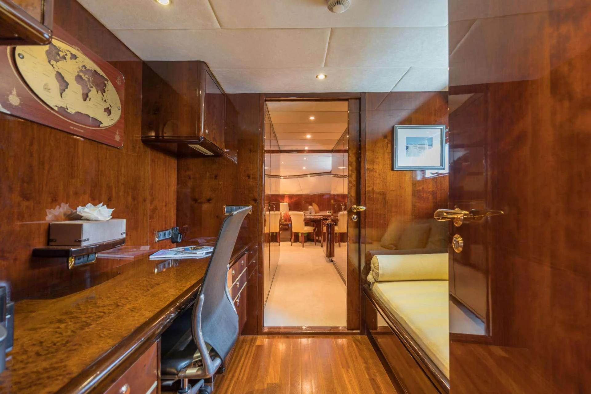 a room with a table and chairs aboard XANADU OF LONDON Yacht for Charter