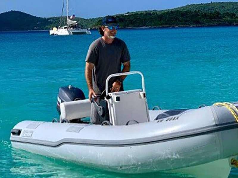 a man standing on a boat aboard DEEPBLUE Yacht for Charter