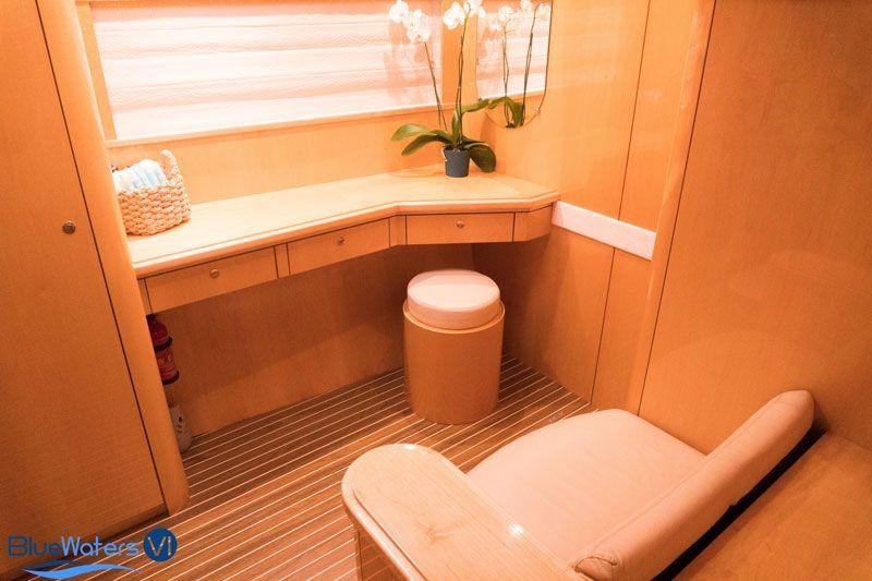 a bathroom with a tub and a sink aboard LUAR Yacht for Charter