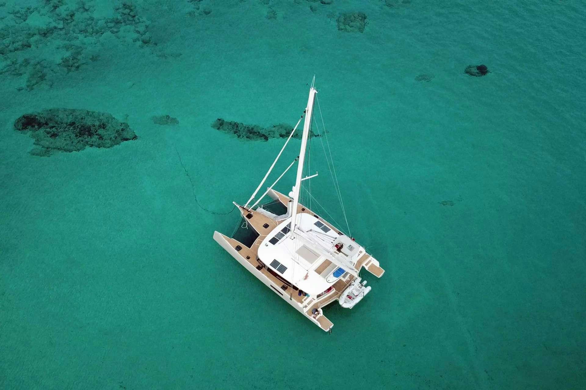 a boat in the water aboard TRILOGY Yacht for Charter