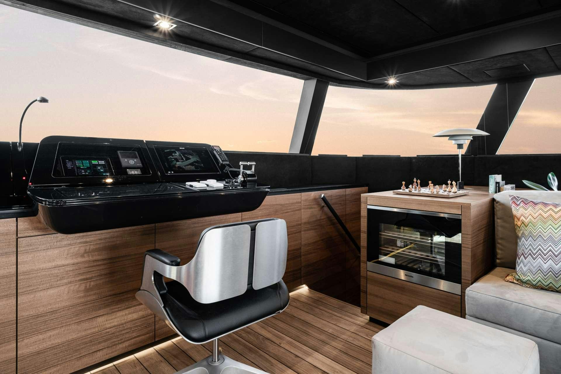 a piano in a room aboard E SUPERCAT Yacht for Charter