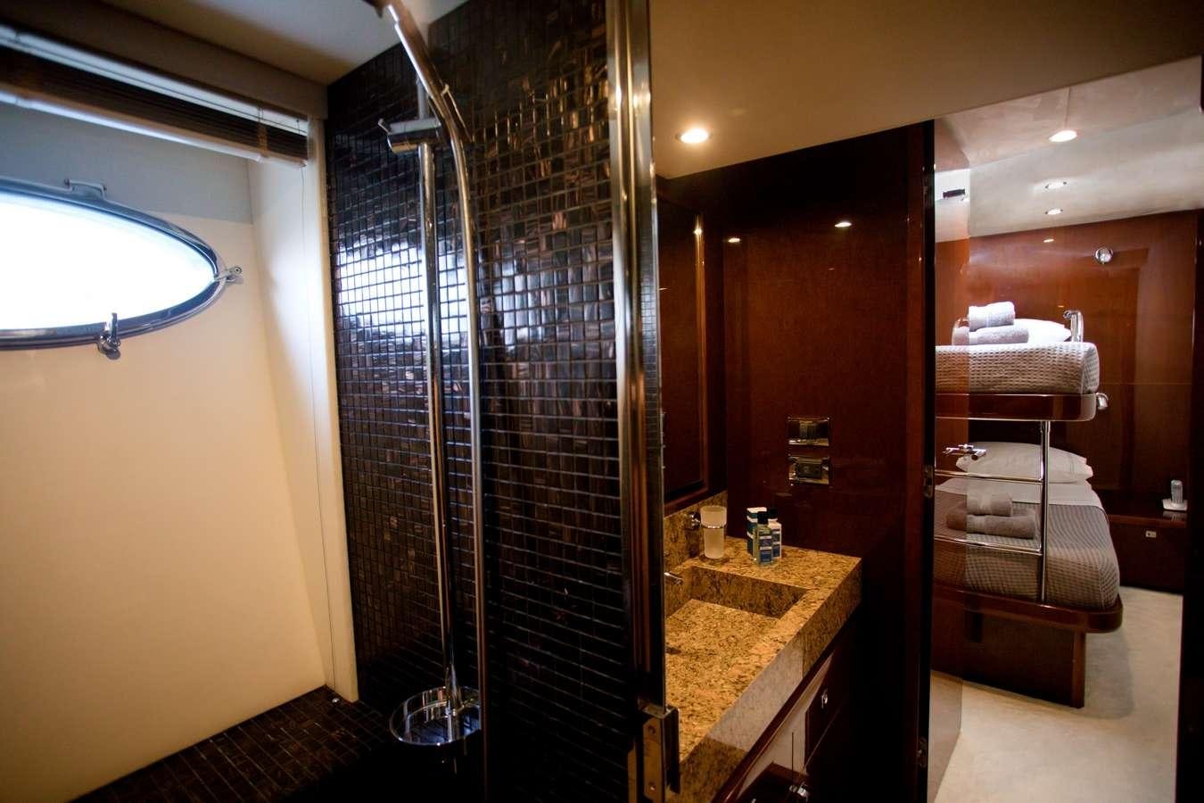 a bathroom with a glass shower aboard GIA SENA Yacht for Charter