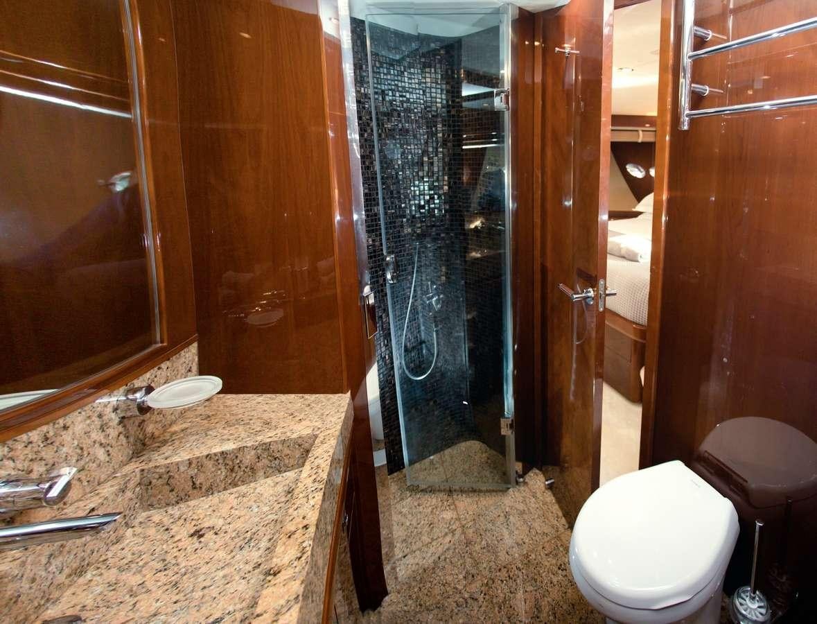 a bathroom with a marble counter aboard GIA SENA Yacht for Charter