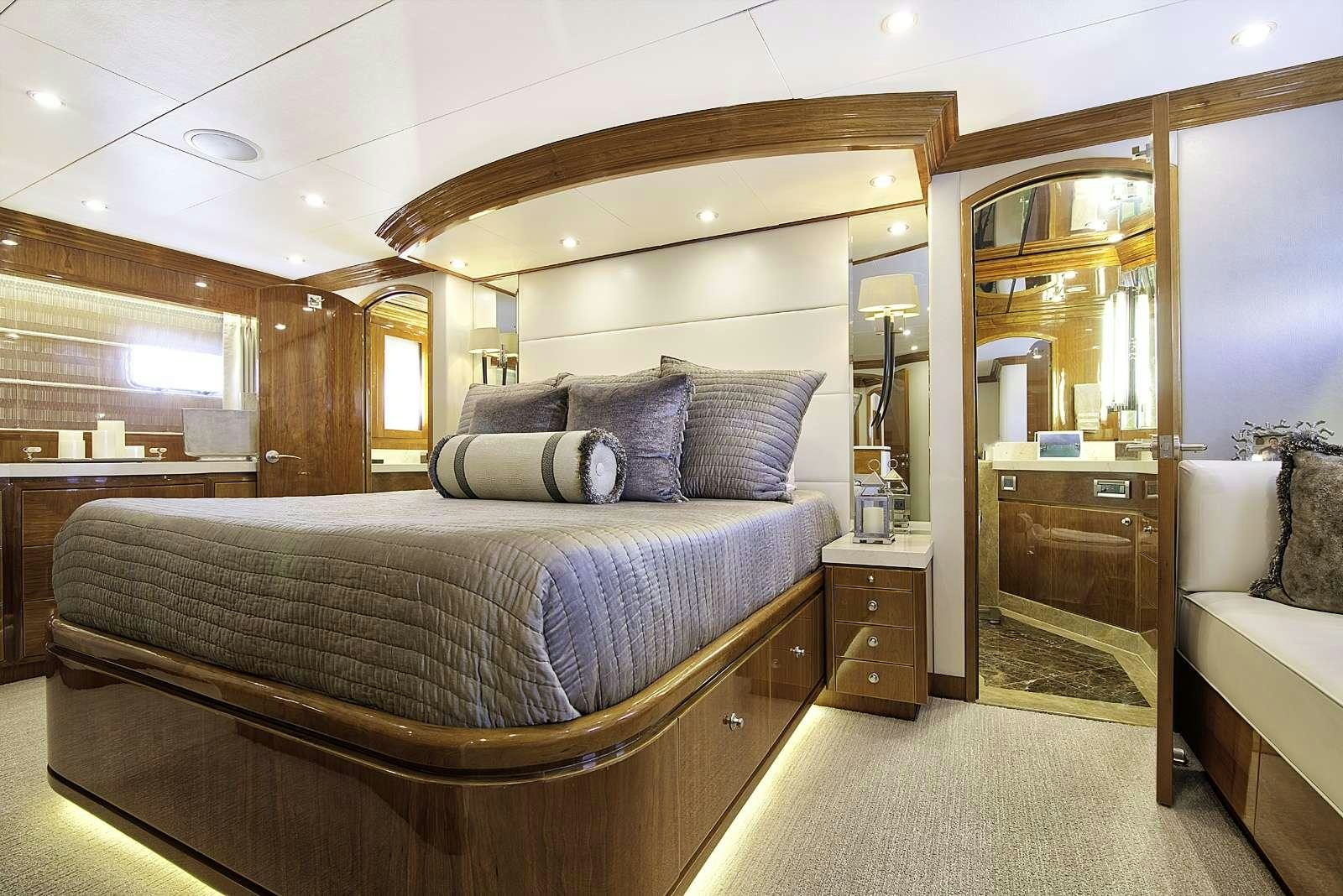 a bed in a room aboard STERLING V Yacht for Charter