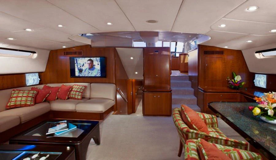 a living room with a couch and a table aboard SEAQUELL Yacht for Charter