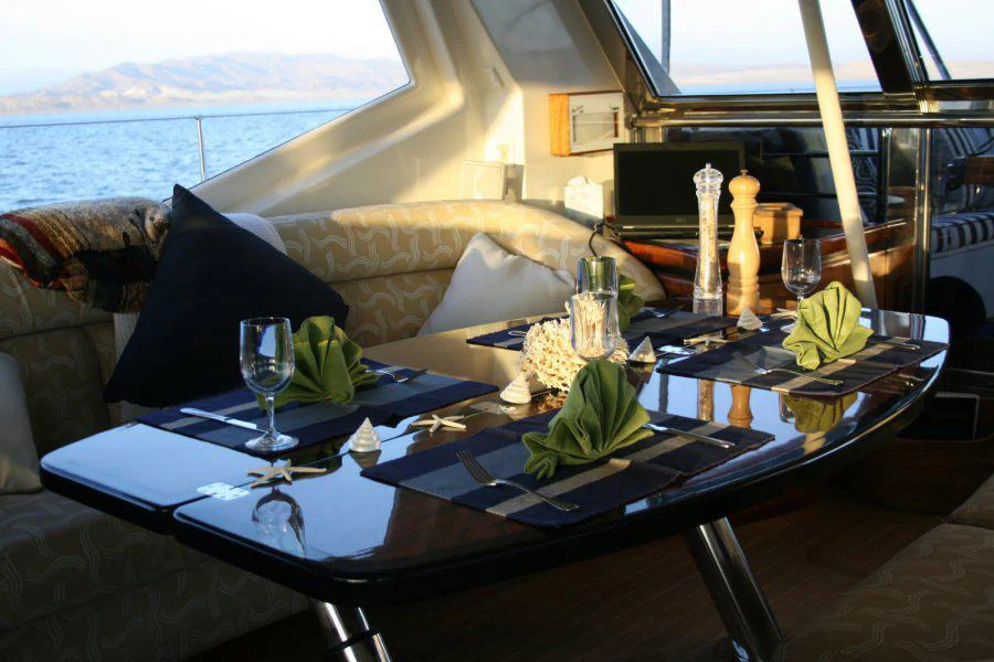 a table with food and drinks on it aboard SEAQUELL Yacht for Charter