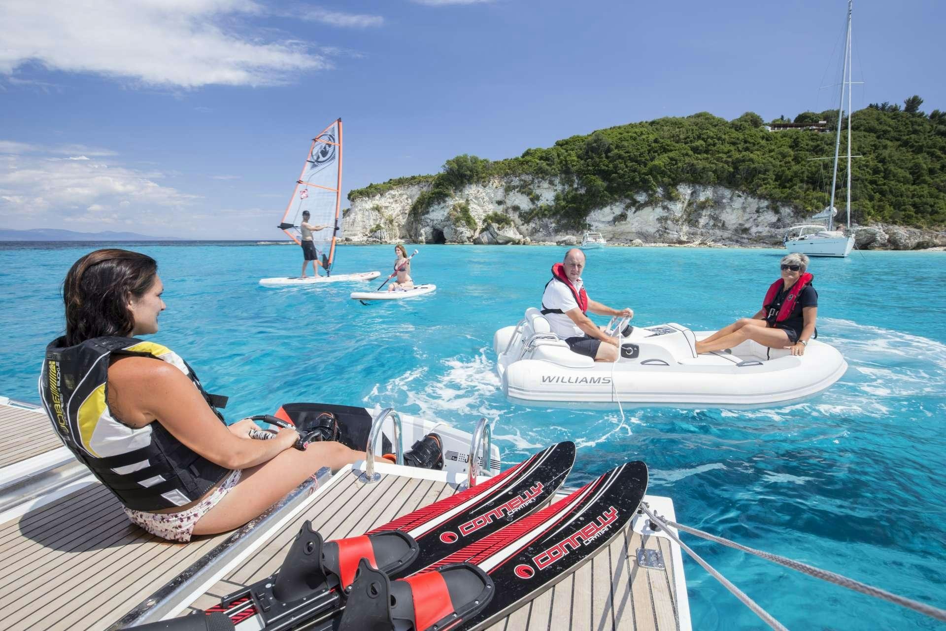 people on a boat in the water aboard JEANNEAU 64 Yacht for Charter