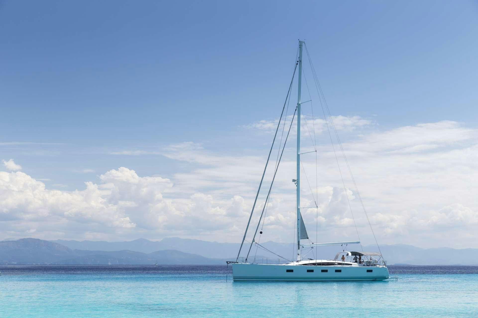 a boat in the water aboard JEANNEAU 64 Yacht for Charter