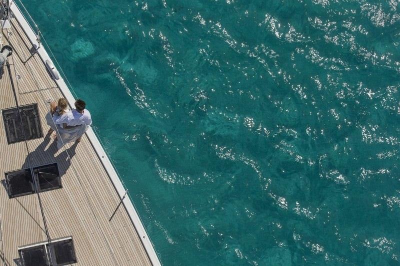 people on a boat in the water aboard JEANNEAU 64 Yacht for Charter