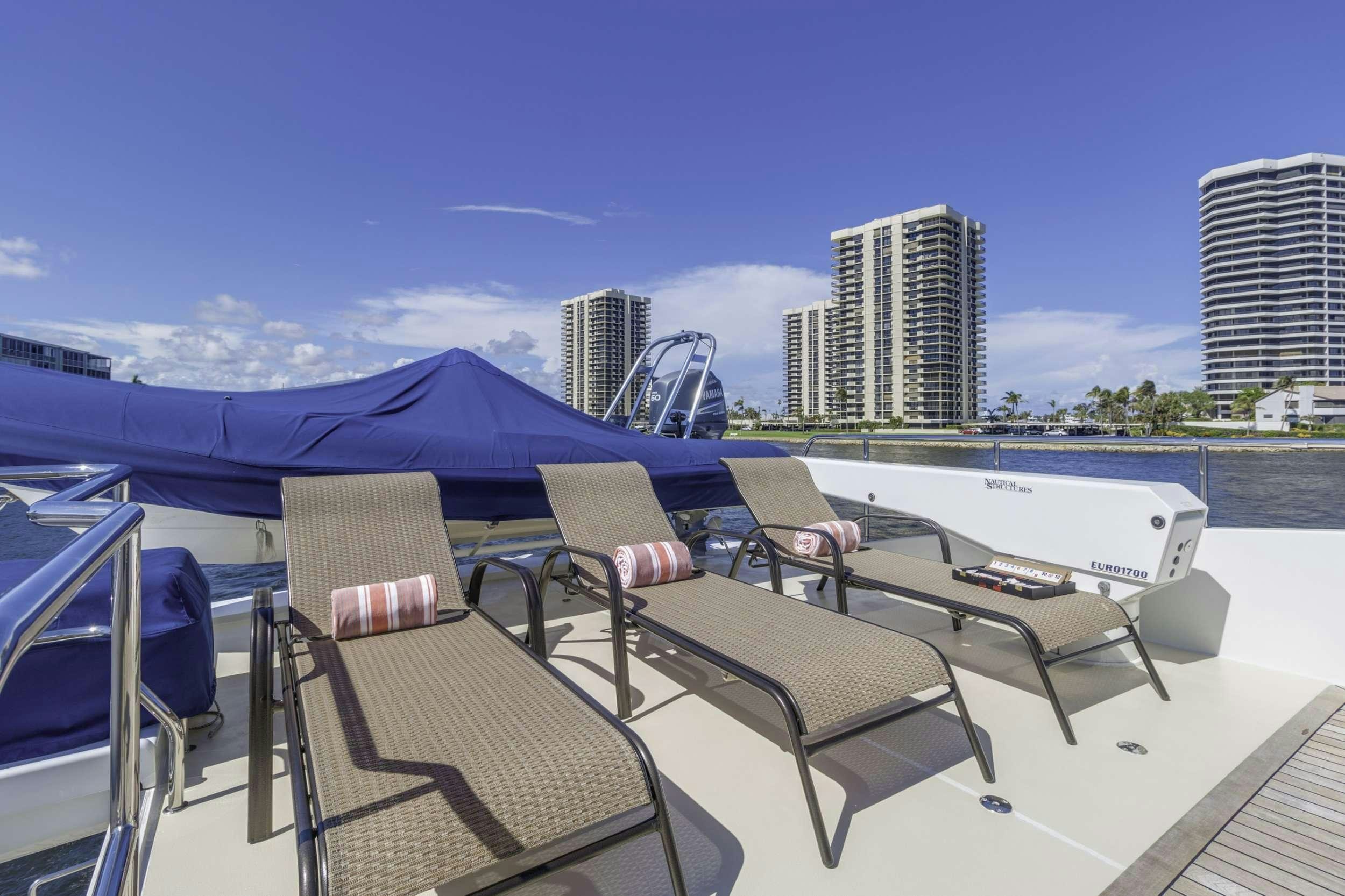 a group of chairs on a boat aboard WINDWARD Yacht for Charter