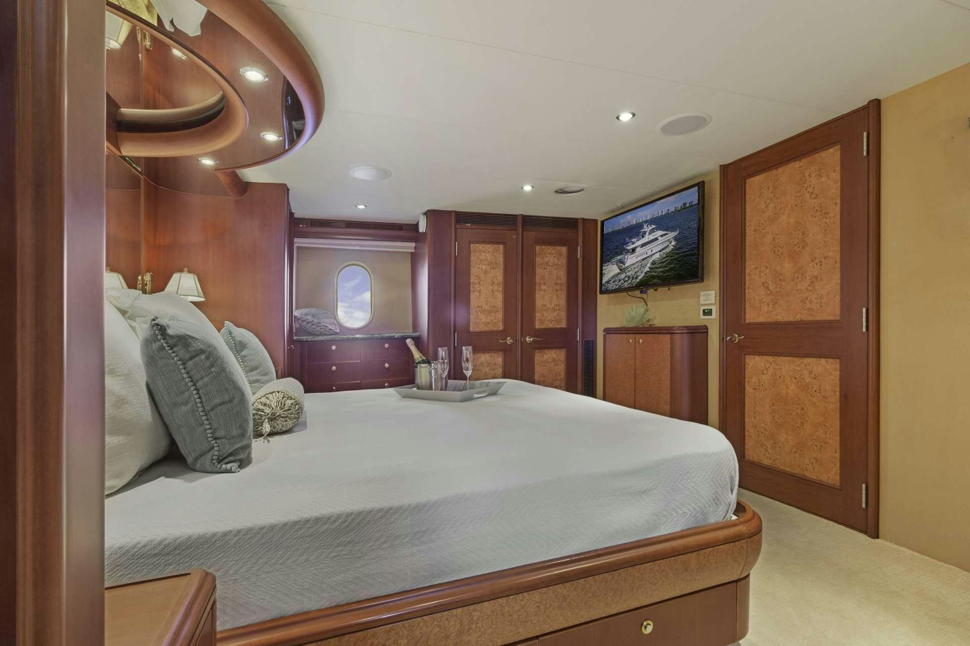 a bed in a hotel room aboard WINDWARD Yacht for Charter