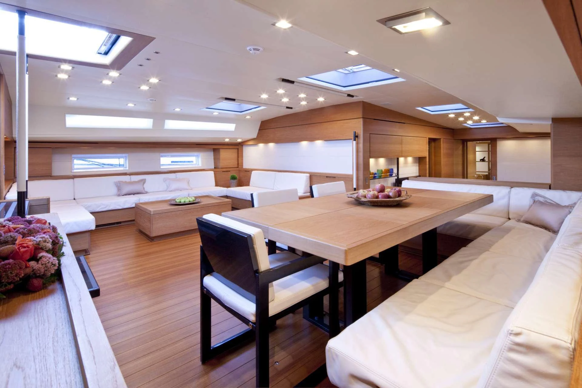 a room with a table and chairs aboard THALIMA Yacht for Charter