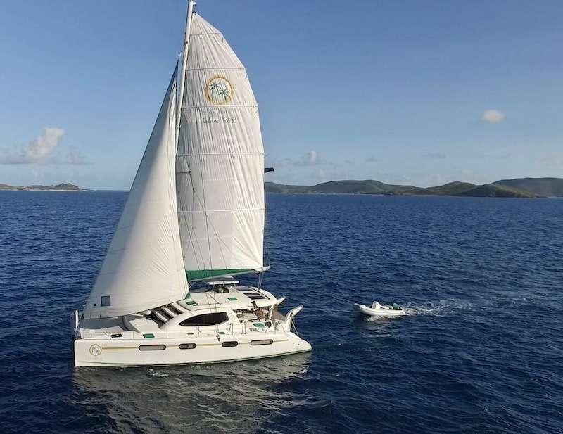 a sailboat on the water aboard ISLAND R&amp;R Yacht for Charter