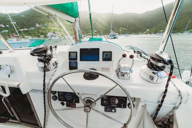 a boat with a view of the water and land below aboard ISLAND R&amp;R Yacht for Charter