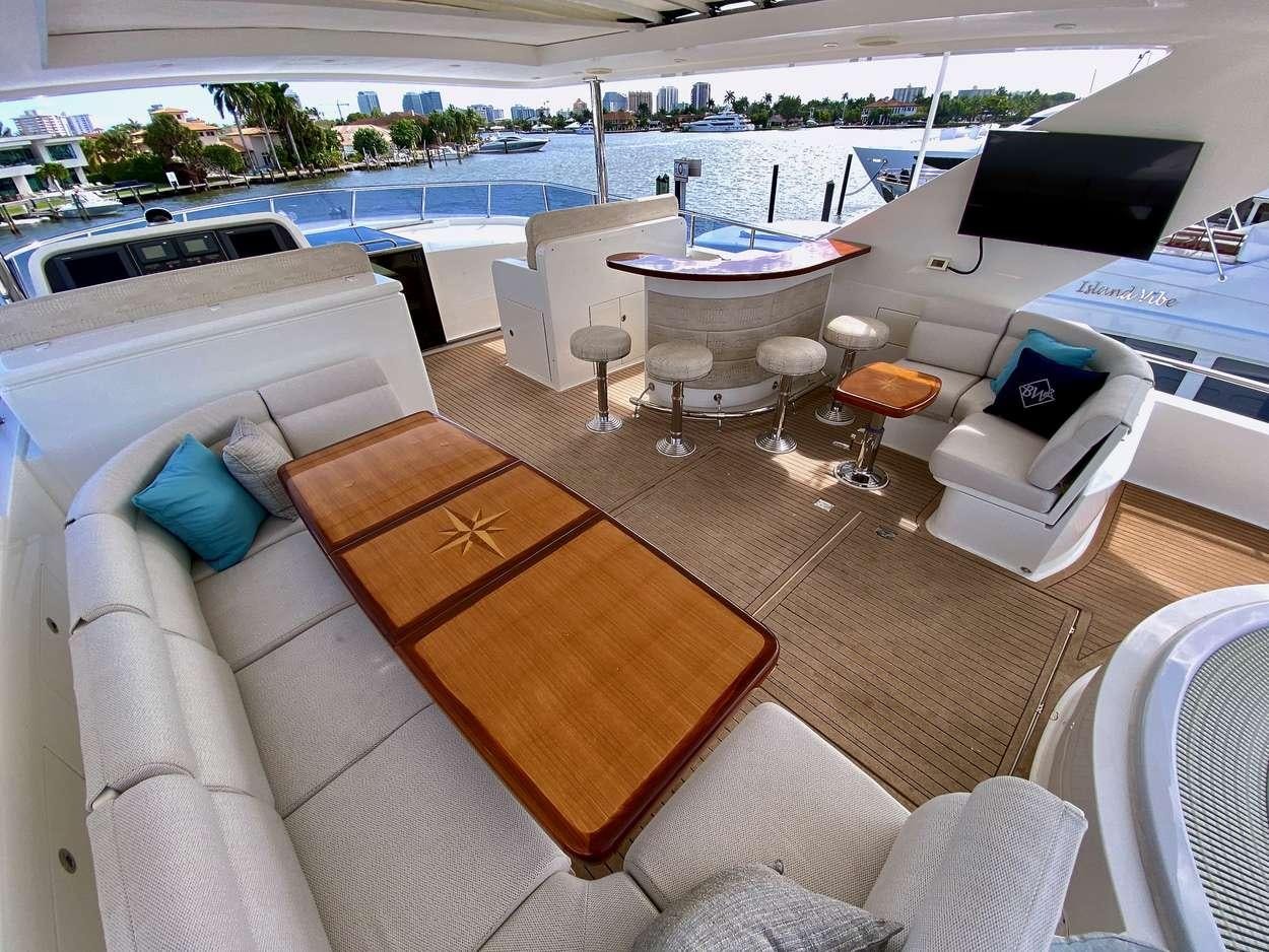 a living room with a large patio aboard BRANDI WINE Yacht for Charter