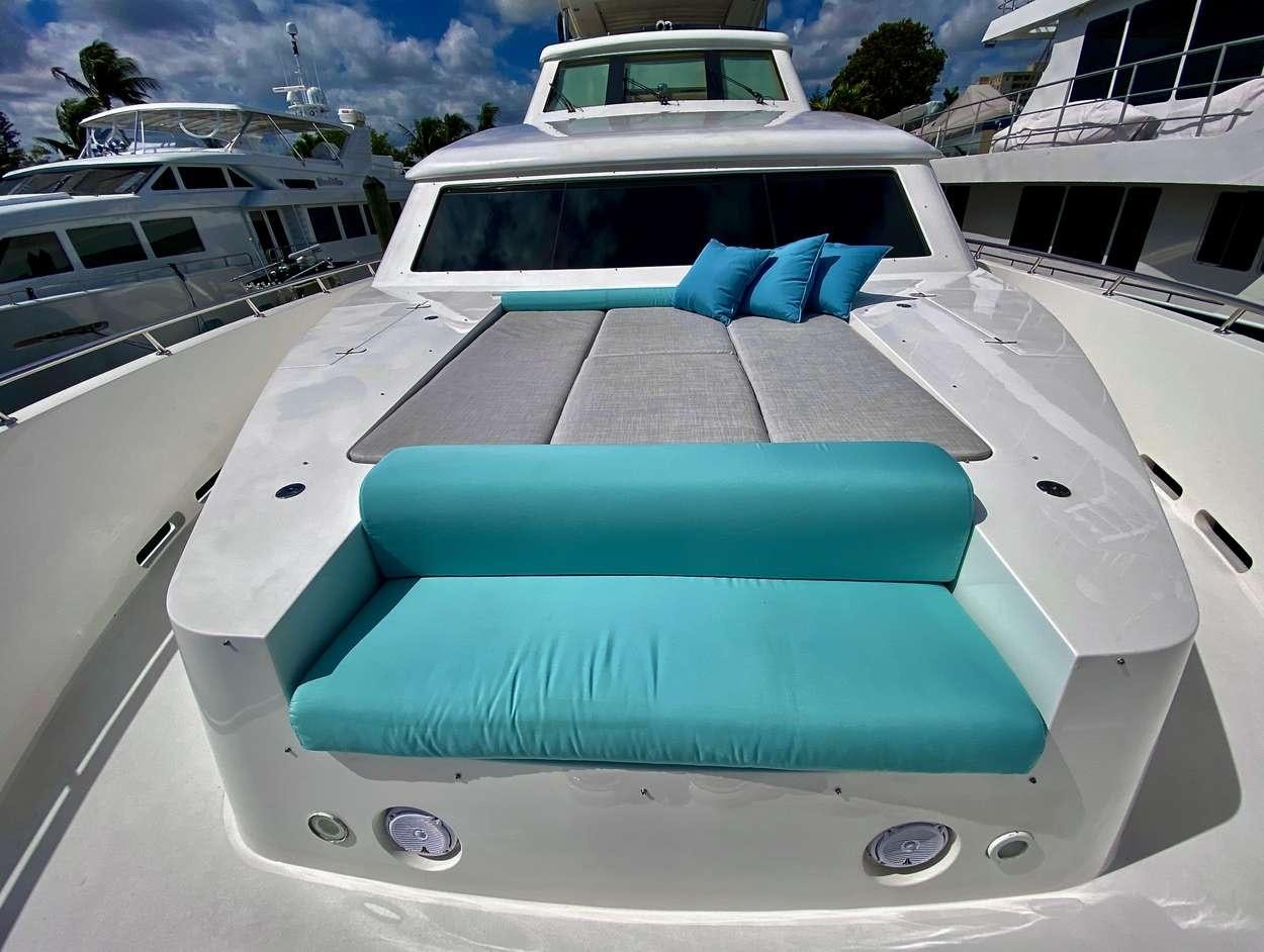 the front of a white car aboard BRANDI WINE Yacht for Charter