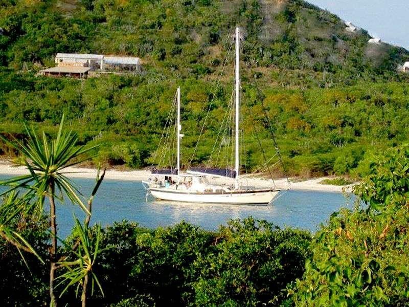 a sailboat on a river aboard JALAPE&Ntilde;O Yacht for Charter