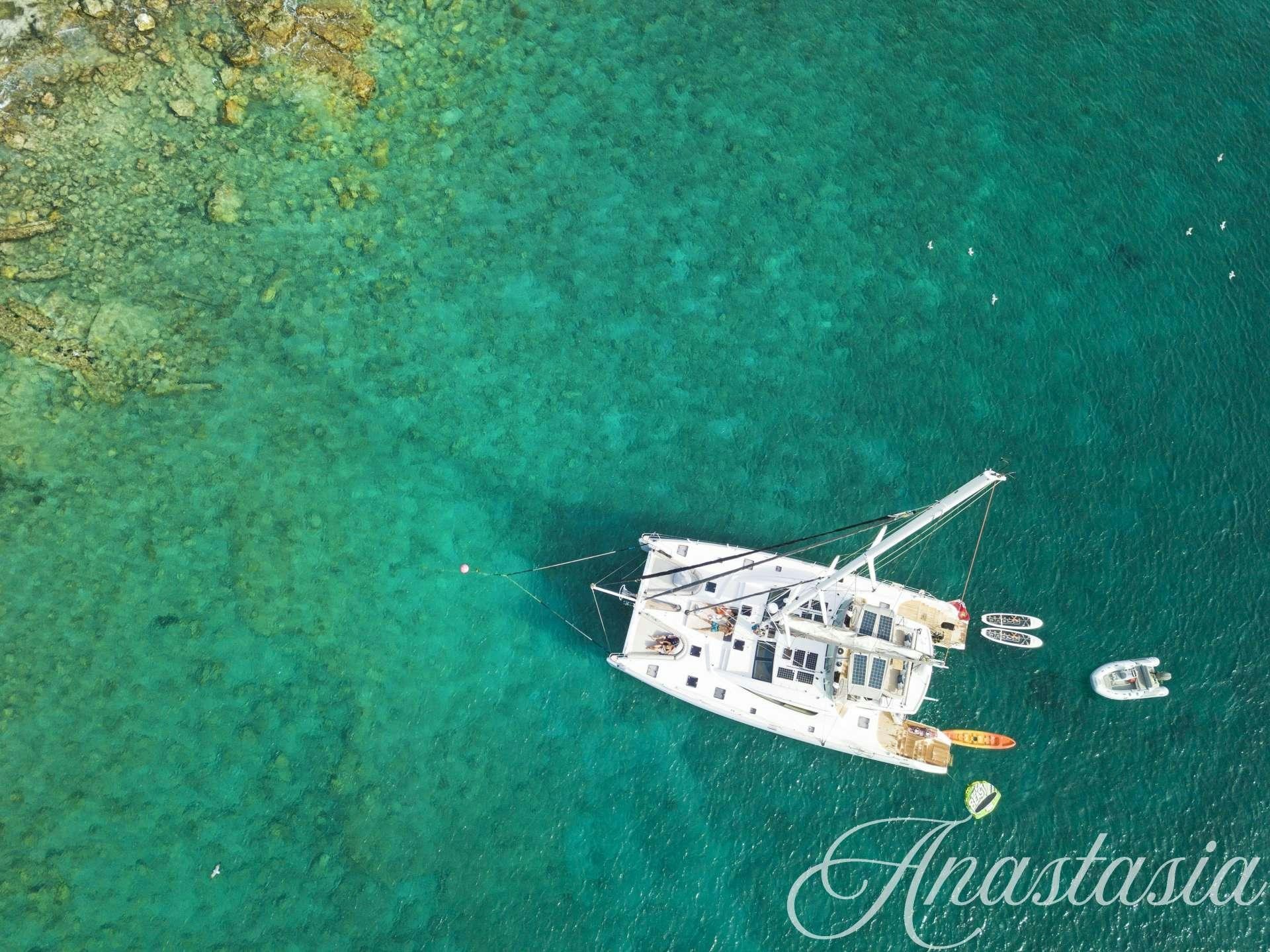 a boat in the water aboard ANASTASIA Yacht for Charter