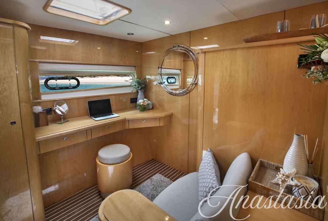 a room with a desk and a chair aboard ANASTASIA Yacht for Charter