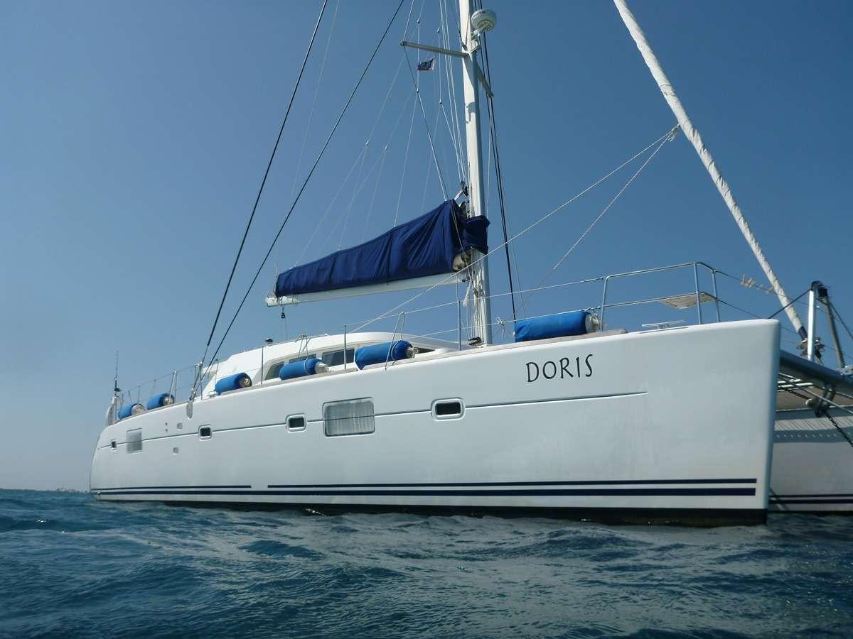 a white boat in the water aboard DORIS Yacht for Charter