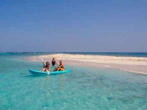 a group of people on a boat in the ocean aboard DORIS Yacht for Charter
