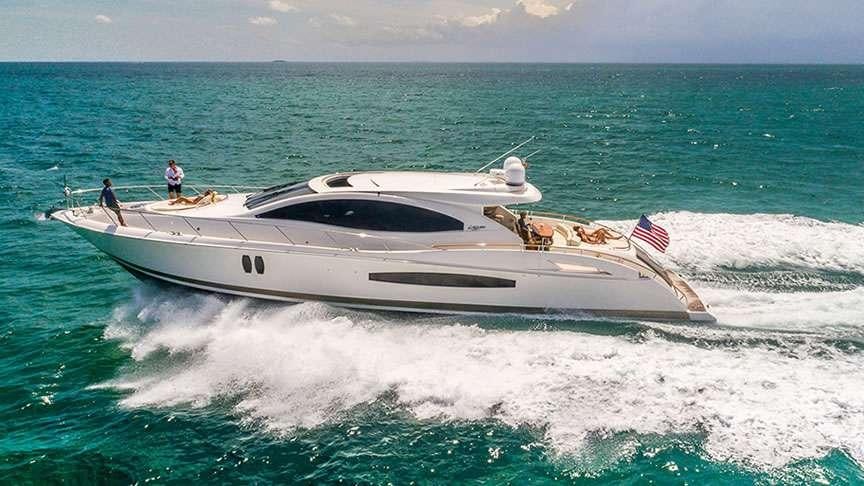 a white boat in the water aboard LADY H Yacht for Charter