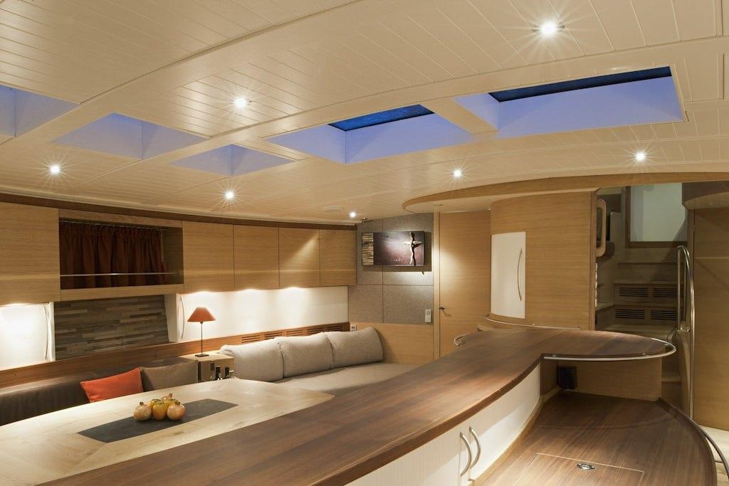 a modern looking living room aboard HELENE Yacht for Charter